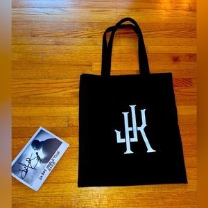 Jo Koy bag with signed 2023 world tour card